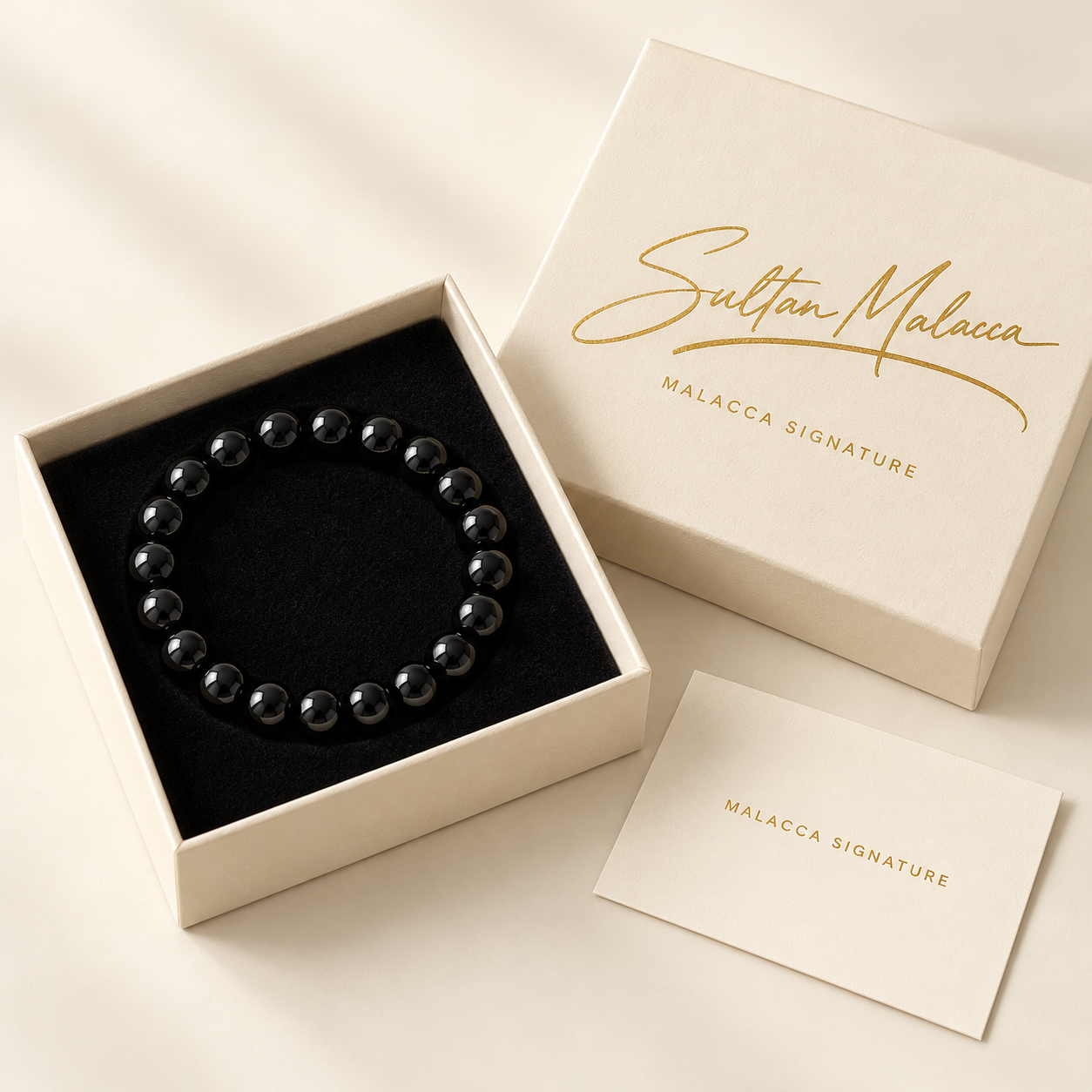Malacca Signature packaging with gold signature lettering